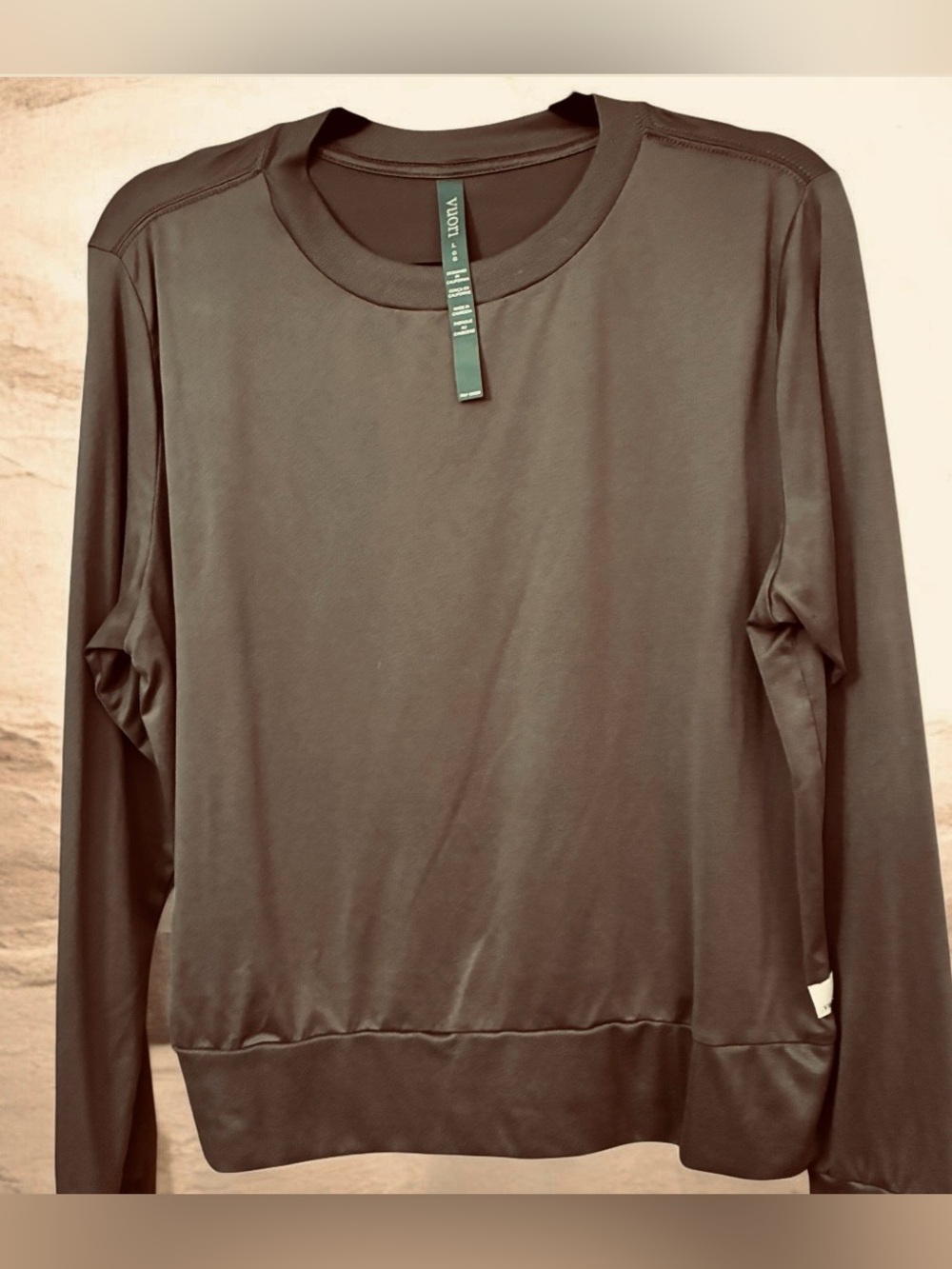 Vuori Long Sleeve Crewneck Top in a dark plum